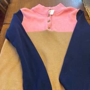 Button Down Sweater. Never worn with Tags. Beautiful colors.